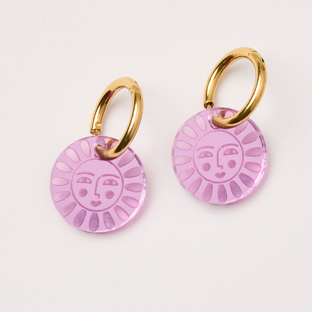 laser cut acrylic flower charm earrings with a face hang in violet on hoops